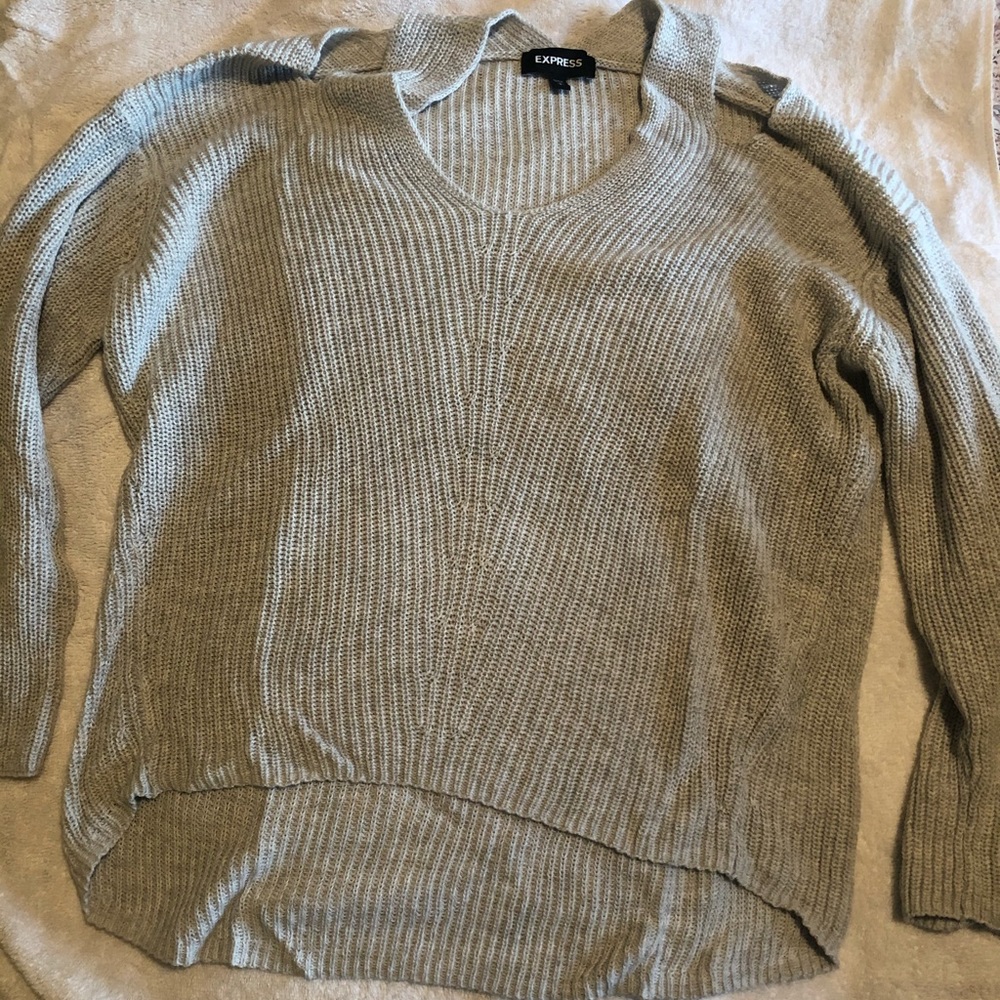 Sweater with open shoulder detail. Pristine